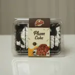 Plum Cake Rich and moist plum cake with egg from Pammi’s Bakers, topped with dried fruits and nuts – perfect for celebrations, gifting, or tea-time.